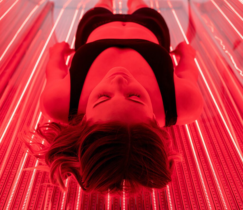 women in red light therapy procedure